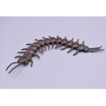 A bronze model of a centipede. 15 cm long.