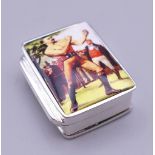 A silver pill box decorated with a boxer. 3.25 cm high.