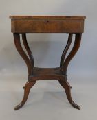 A 19th century mahogany work table. 52 cm wide.