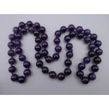 A string of amethyst beads. 70 cm long.