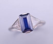 An Art Deco 585 platinum diamond and sapphire ring. Ring size L/M.