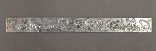 A Chinese silver plated scroll weight. 23 cm long.