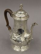 WITHDRAWN - A silver coffee pot, hallmarked for London 1766. 20 cm high.