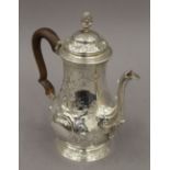 WITHDRAWN - A silver coffee pot, hallmarked for London 1766. 20 cm high.