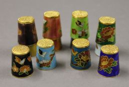 Twelve cloisonne thimbles