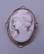 A 9 ct gold Art Nouveau cameo brooch. 5 cm high.