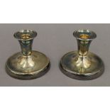 A pair of David Anderson Norwegian 830 silver candlesticks. 8 cm high. 16.2 troy ounces loaded.