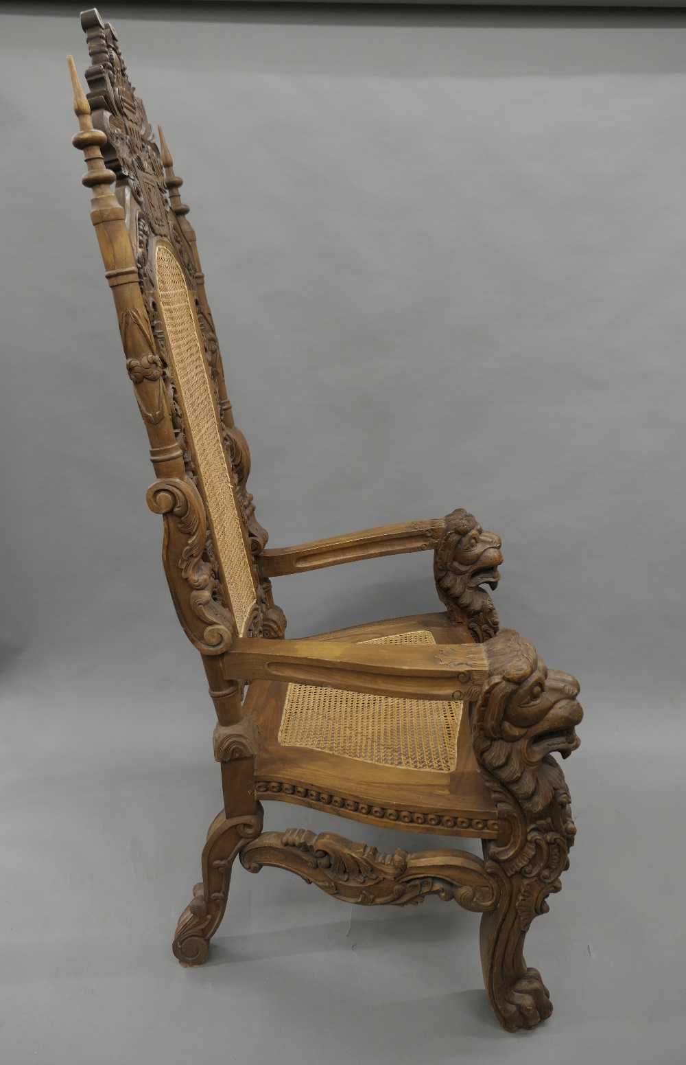 A large Eastern, possibly Indonesian, carved and caned open armchair. 94 cm wide x 180 cm high. - Image 5 of 6