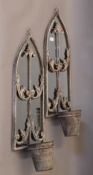 A pair of garden pot mirrors. 55.5 cm high.