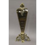 A brass fan fire guard. 60 cm high.