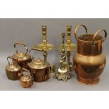 A quantity of various brass and copper ware, including kettles, candlesticks, etc.