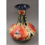 A Moorcroft style vase. 40 cm high.