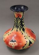 A Moorcroft style vase. 40 cm high.