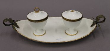 An 18th/19th century Sevres desk stand. 37 cm wide.