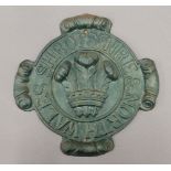 A cast iron insurance plaque for Shropshire and North Wales. 24 cm wide.