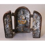 An Oriental bronze triptych. 14 cm high.