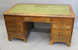 A mahogany pedestal desk. 153.5 cm wide x 85 cm deep.