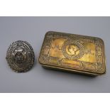 A WWI Christmas 1914 brass tin given to the troops by Princess Mary and a pouch badge '4th Battn,