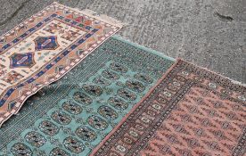 A small green ground rug,