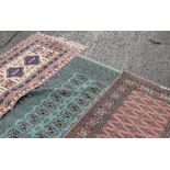 A small green ground rug,