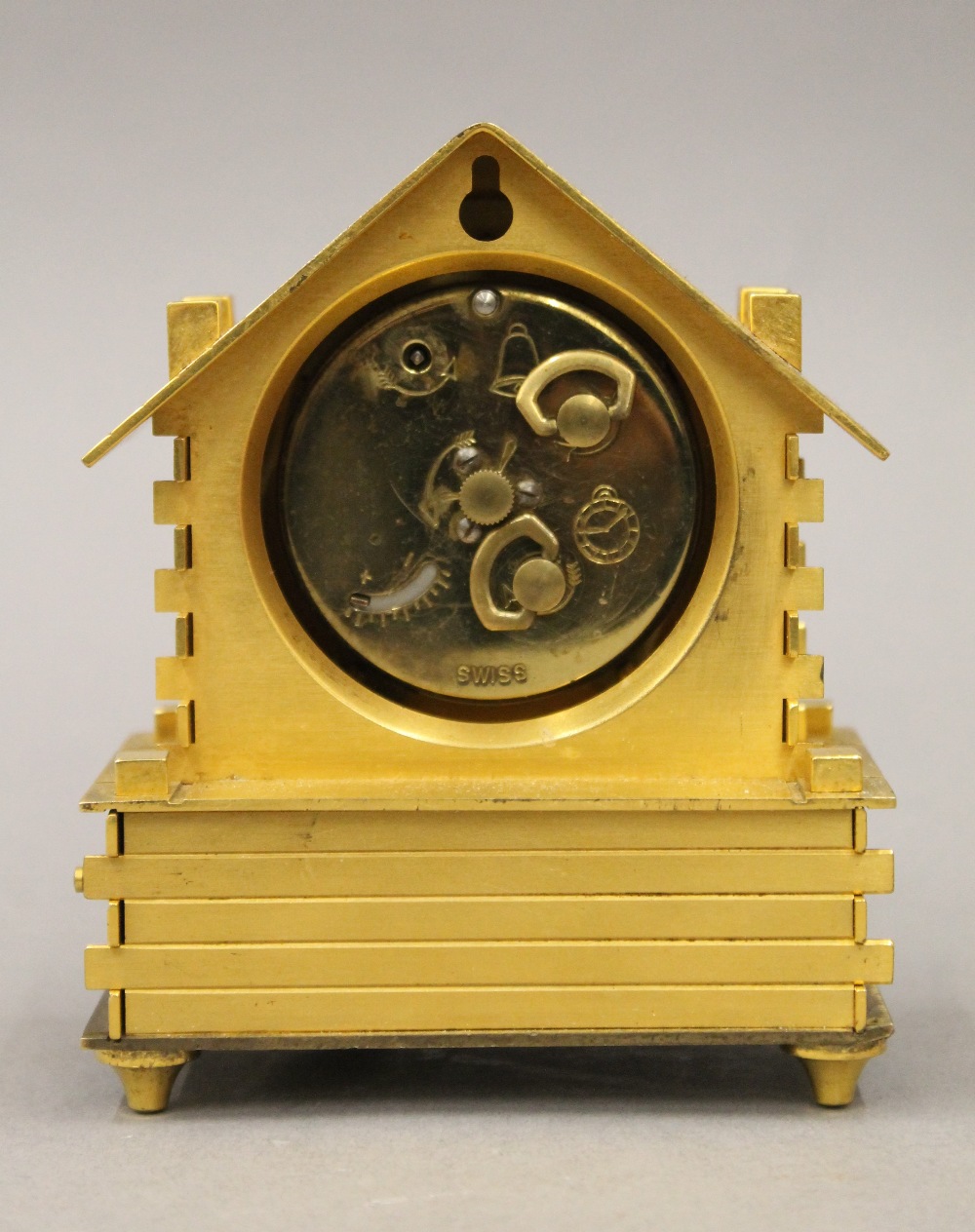 A brass cased Swiss desk clock formed as a Chalet. 11 cm high. - Image 5 of 5