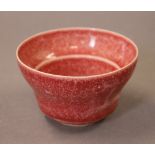 A small Chinese red porcelain bowl. 9.5 cm diameter.