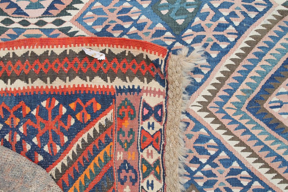 A Caucasian wool rug, 145 x 220 cm and a cream ground rug, 90 x 40 cm. - Image 2 of 6