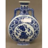 A Chinese porcelain blue and white moon flask. 24 cm high.