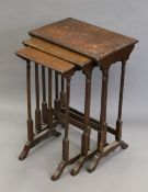 An early 20th century nest of three mahogany tables. 50 cm wide.