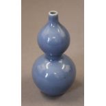 A small Chinese double gourd blue porcelain vase. 11.5 cm high.