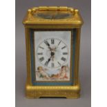 A French gilt cased repeating carriage clock set with Sevres style porcelain panels. 17 cm high.