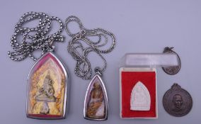 A collection of various Thai amulets, etc.