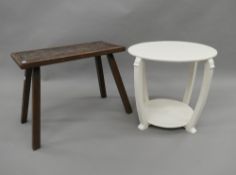 An Art Deco white painted side table and a carved oak stool. The latter 56 cm wide.