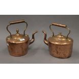 Two Victorian copper kettles. Each approximately 26 cm high.