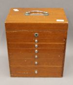 A vintage dentist travelling cabinet. 37 cm high.