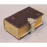A 19th century Dutch New Testament with silver clasp. 13 cm high.