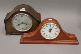 An early 20th century oak mantle clock and another mantle clock. The former 21 cm high.