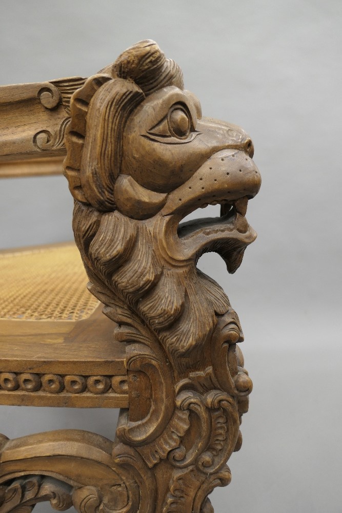 A large Eastern, possibly Indonesian, carved and caned open armchair. 94 cm wide x 180 cm high. - Image 6 of 6