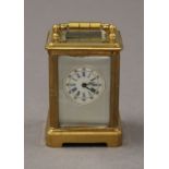 A miniature carriage clock. 7.5 cm high.
