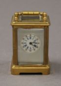 A miniature carriage clock. 7.5 cm high.