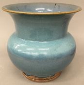A Chinese Jun Ware type blue glazed vase. 20.5 cm high x 21 cm diameter.