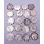 Twenty silver 6pence coins,