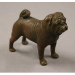 A bronze model of pug dog. 6 cm high.