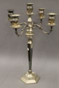 A large silver plated candelabra. 77 cm high.