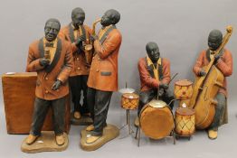 A set of six large resin jazz band figures. The pianist 38 cm high.