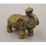 A Chinese bronze model of an elephant. 15.5 cm long.