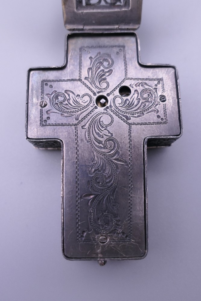 A 19th century unmarked white metal cross form pendant watch. 8 cm high. - Image 7 of 11