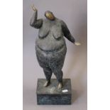 An abstract patinated bronze of a large lady. 45.5 cm high.