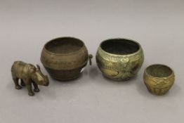 Three African brass bowls of similar form,