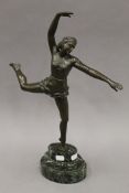 A patinated bronze model of an Art Deco dancing lady, signed S MELANI,